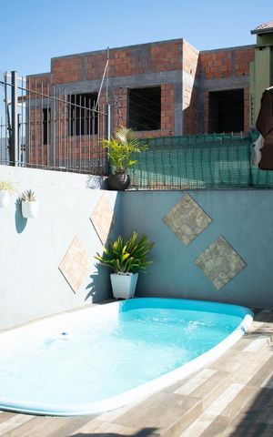 Casa à venda com 138m², 3 quartos e 2 vagasPiscina