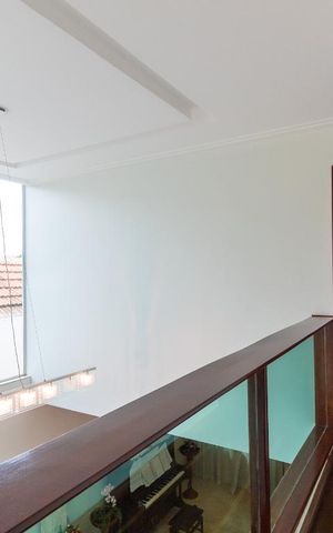 Casa à venda com 440m², 4 quartos e 4 vagas Casa à venda com 440m², 4 quartos e 4 vagasCorredor