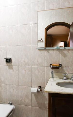 Casa à venda com 220m², 3 quartos e 6 vagasBanheiro suíte 1