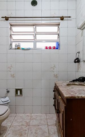 Casa à venda com 306m², 3 quartos e 2 vagasBanheiro