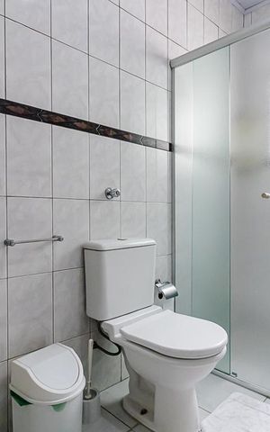 Casa à venda com 306m², 3 quartos e 2 vagasBanheiro da Suíte