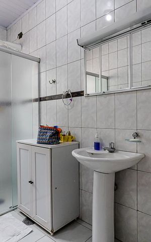 Casa à venda com 306m², 3 quartos e 2 vagasBanheiro da Suíte