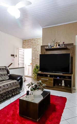 Casa à venda com 306m², 3 quartos e 2 vagasSala de Estar