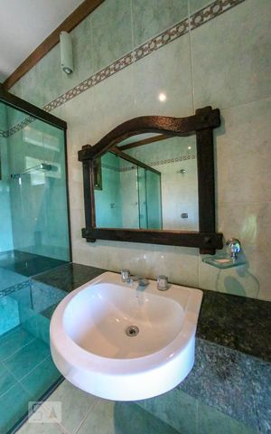 Casa de condomínio à venda com 520m², 4 quartos e 4 vagasBanheiro Social