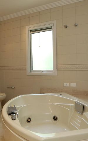 Casa de condomínio à venda com 670m², 4 quartos e 4 vagasBanheiro da Suíte 4