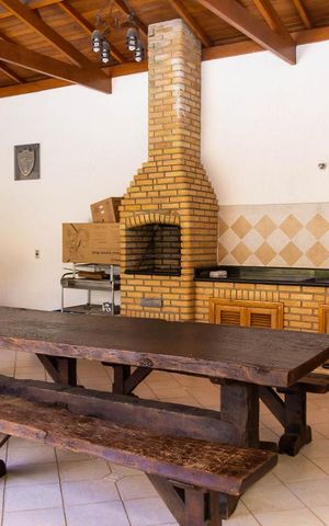 Casa de condomínio à venda com 586m², 4 quartos e 3 vagasVaranda gourmet