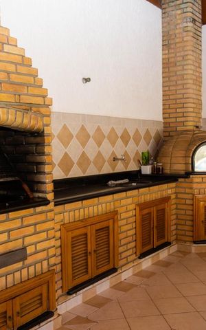 Casa de condomínio à venda com 586m², 4 quartos e 3 vagasVaranda gourmet