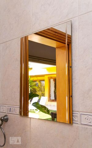 Casa de condomínio à venda com 586m², 4 quartos e 3 vagasBanheiro