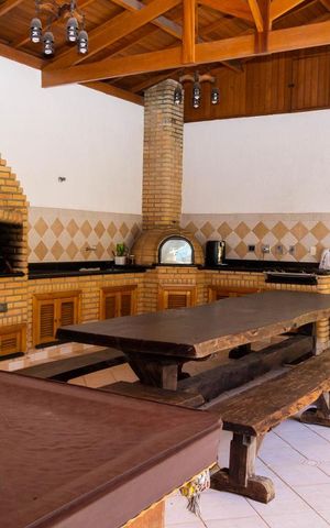 Casa de condomínio à venda com 586m², 4 quartos e 3 vagasVaranda gourmet