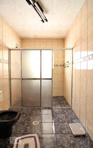 Casa à venda com 125m², 4 quartos e 4 vagasBanheiro Social 1