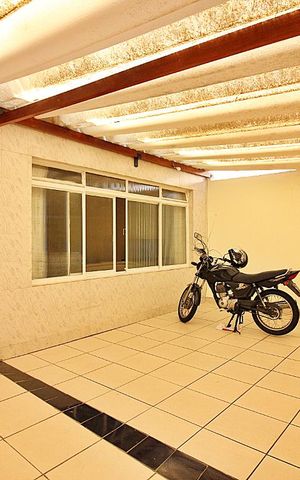 Casa à venda com 125m², 4 quartos e 4 vagasGaragem