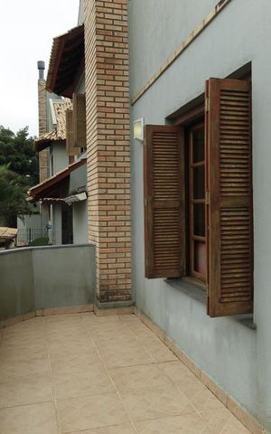 Casa de condomínio à venda com 195m², 3 quartos e 2 vagas Casa de condomínio à venda com 195m², 3 quartos e 2 vagasVaranda da sala