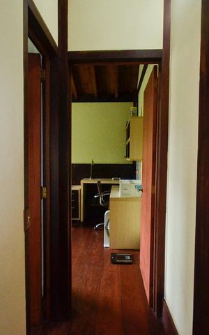 Casa de condomínio à venda com 379m², 4 quartos e 2 vagas Casa de condomínio à venda com 379m², 4 quartos e 2 vagasCorredor