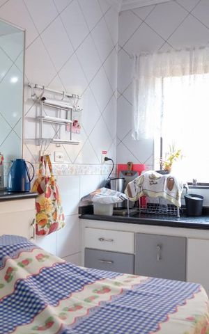 Casa à venda com 413m², 4 quartos e 5 vagas Casa à venda com 413m², 4 quartos e 5 vagasCozinha