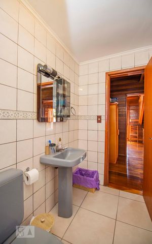 Casa à venda com 258m², 3 quartos e 3 vagasBanheiro 