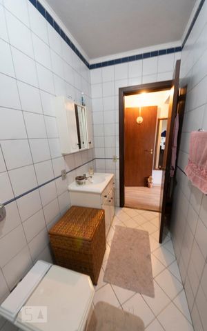 Casa à venda com 217m², 4 quartos e 2 vagasBanheiro