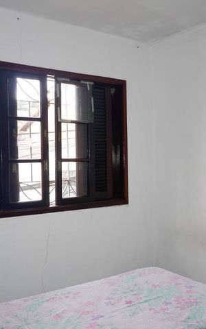 Casa à venda com 107m², 2 quartos e 2 vagasSuíte