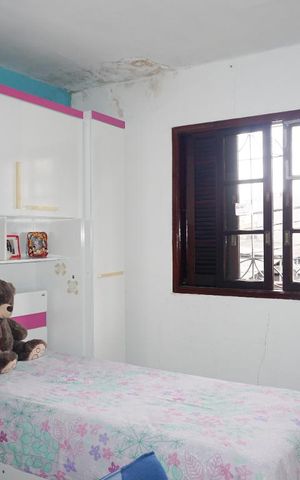 Casa à venda com 107m², 2 quartos e 2 vagasSuíte