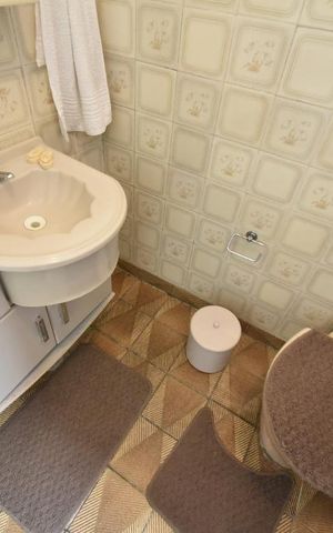Casa à venda com 300m², 3 quartos e sem vagaBanheiro da suite