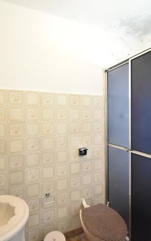 Casa à venda com 300m², 3 quartos e sem vagaBanheiro da suite
