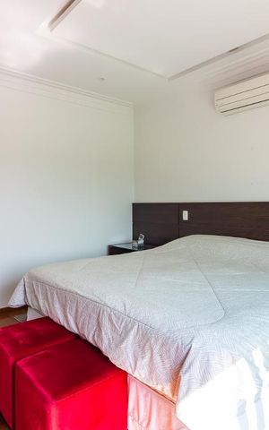 Casa de condomínio à venda com 490m², 4 quartos e 6 vagasSuíte Principal