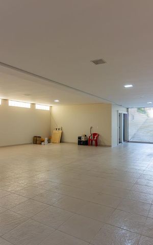Casa de condomínio à venda com 490m², 4 quartos e 6 vagasGaragem