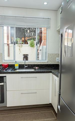 Casa de condomínio à venda com 100m², 3 quartos e 2 vagas Casa de condomínio à venda com 100m², 3 quartos e 2 vagasSala e cozinha integradas