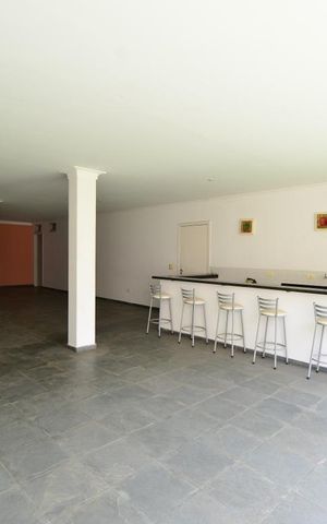 Casa à venda com 400m², 4 quartos e 4 vagasSalão de festas com churrasqueira
