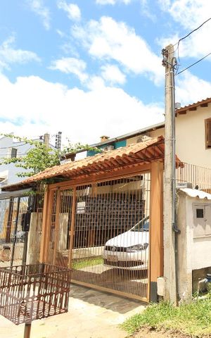 Casa à venda com 95m², 3 quartos e 1 vaga Casa à venda com 95m², 3 quartos e 1 vagaFachada