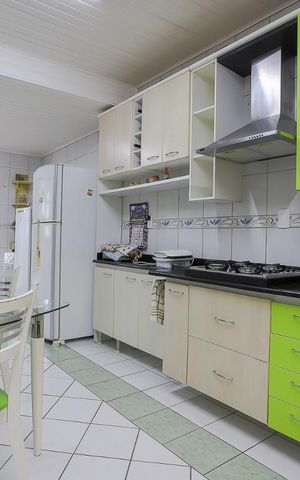 Casa à venda com 430m², 4 quartos e 2 vagas Casa à venda com 430m², 4 quartos e 2 vagasCozinha
