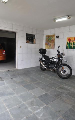 Casa à venda com 280m², 5 quartos e 6 vagasQuintal / Garagem