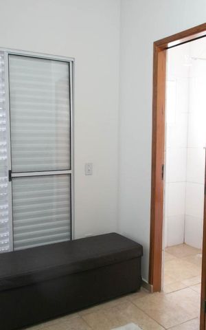 Casa de condomínio à venda com 60m², 2 quartos e 1 vagaSuíte 1