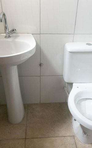 Casa de condomínio à venda com 60m², 2 quartos e 1 vagaBanheiro Suíte 2