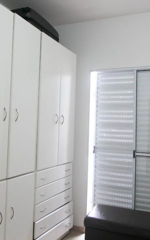 Casa de condomínio à venda com 60m², 2 quartos e 1 vagaSuíte 1