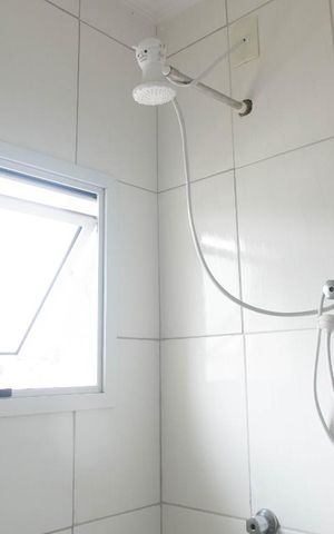 Casa de condomínio à venda com 60m², 2 quartos e 1 vagaBanheiro Suíte 1