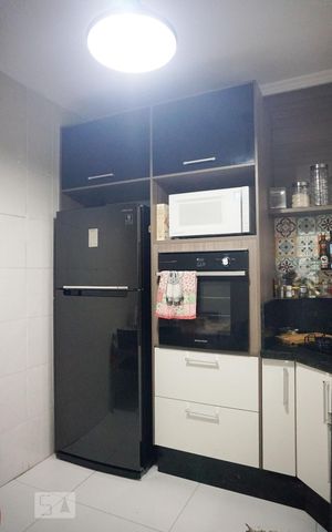 Casa de condomínio à venda com 70m², 2 quartos e 2 vagasCozinha