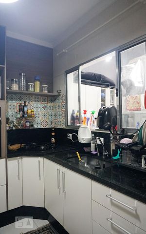 Casa de condomínio à venda com 70m², 2 quartos e 2 vagasCozinha