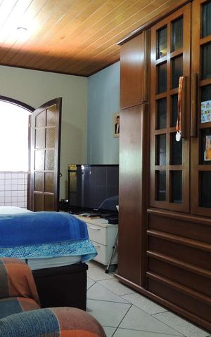 Casa à venda com 166m², 4 quartos e 2 vagasQuarto 4 - Suíte