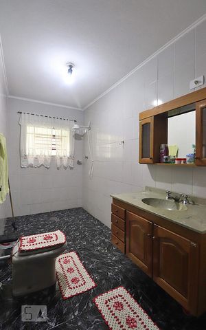 Casa à venda com 392m², 5 quartos e 4 vagasBanheiro 2