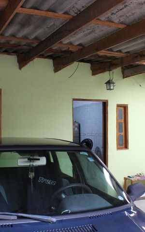 Casa à venda com 80m², 3 quartos e 2 vagasFachada