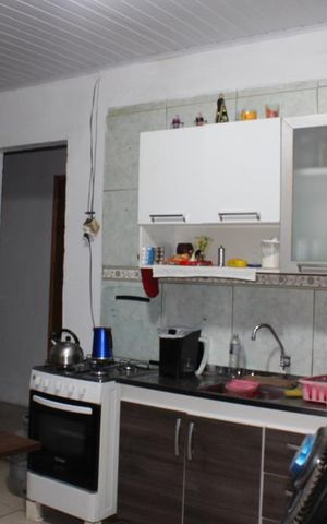 Casa à venda com 80m², 3 quartos e 2 vagasSala/Cozinha