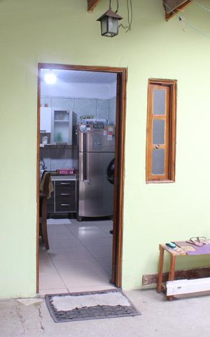 Casa à venda com 80m², 3 quartos e 2 vagasFachada