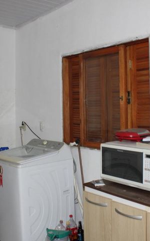 Casa à venda com 80m², 3 quartos e 2 vagasÀrea de Serviço