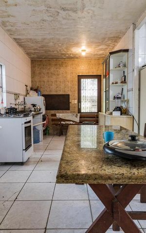 Casa à venda com 200m², 4 quartos e 2 vagas Casa à venda com 200m², 4 quartos e 2 vagasCozinha