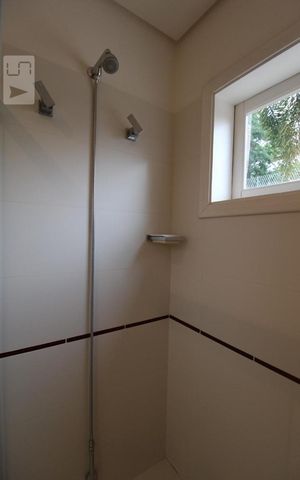 Casa de condomínio à venda com 407m², 4 quartos e sem vagaBanheiro da Suíte 1 (térrea)