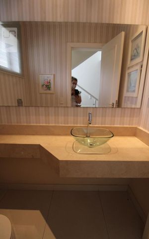 Casa de condomínio à venda com 407m², 4 quartos e sem vagaLavabo