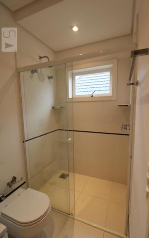Casa de condomínio à venda com 407m², 4 quartos e sem vagaBanheiro da Suíte 3