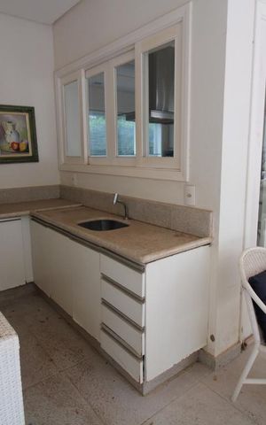 Casa de condomínio à venda com 407m², 4 quartos e sem vagaChurrasqueira