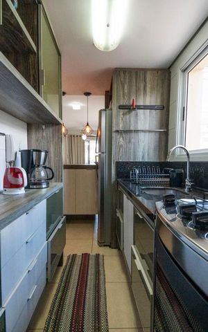 Apartamento à venda com 106m², 2 quartos e 1 vagaCozinha e Área de Serviço