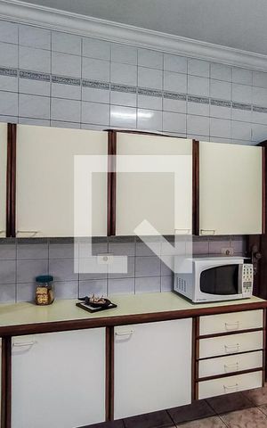 Casa à venda com 170m², 3 quartos e 2 vagas Casa à venda com 170m², 3 quartos e 2 vagasCozinha